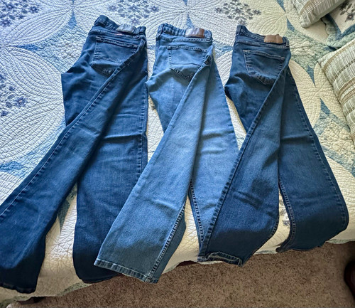 Three pairs blue jeans - three,